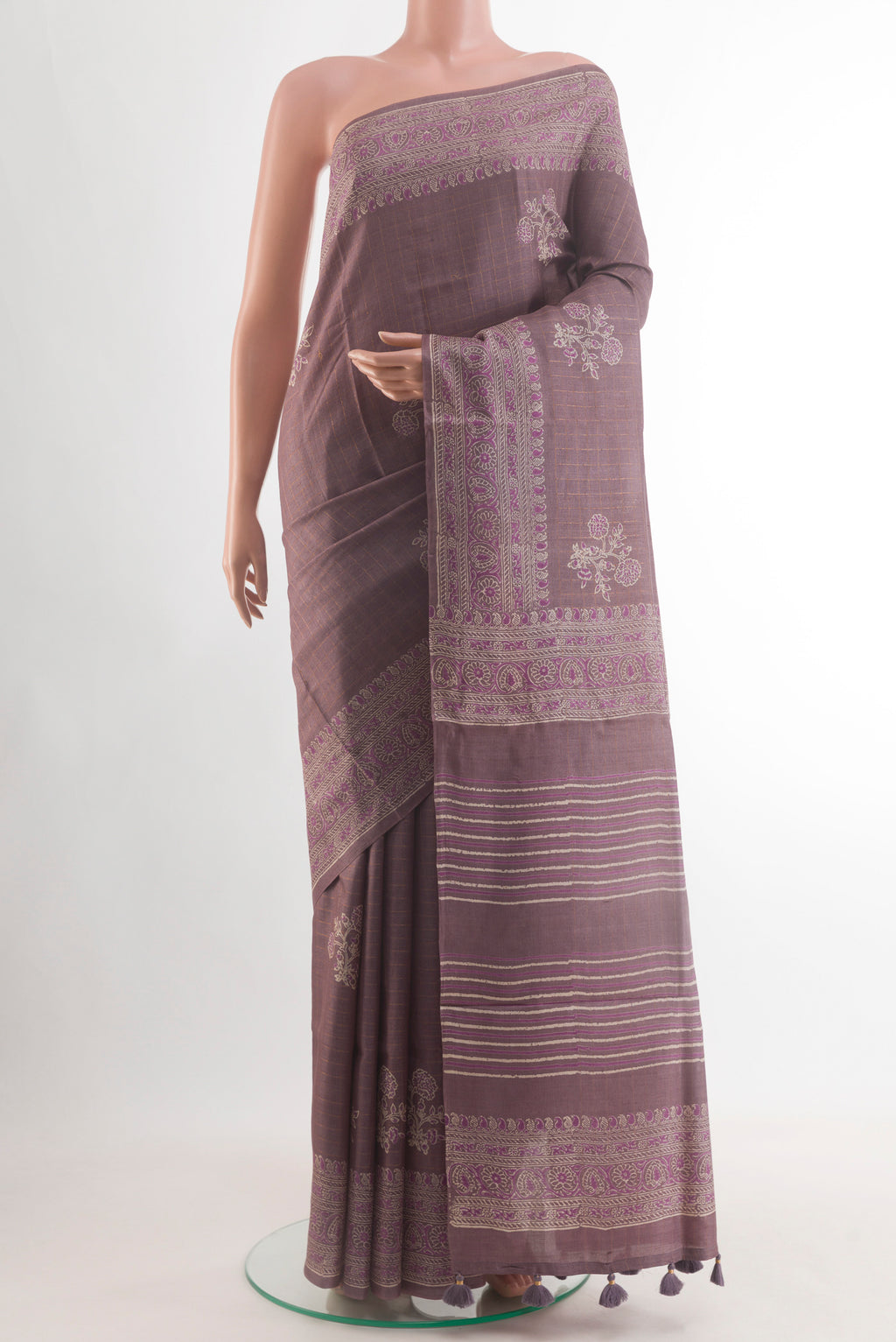 Purple Tussar Silk Saree with Checked design on the body and Plain Border.  displayed on a mannequin