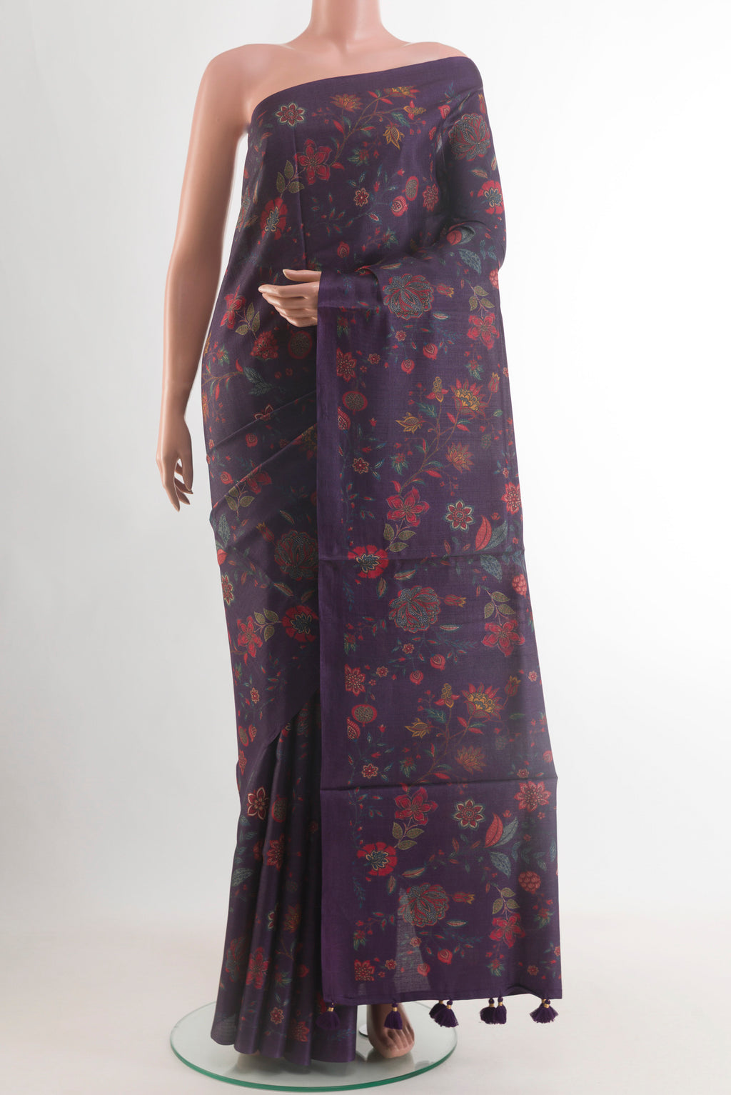 Purple Tussar Silk Saree with Floral Print on the body and Without Border.  displayed on a mannequin