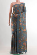 Blue Grey Tussar Silk Saree with Floral Print on the body and Without Border.  displayed on a mannequin