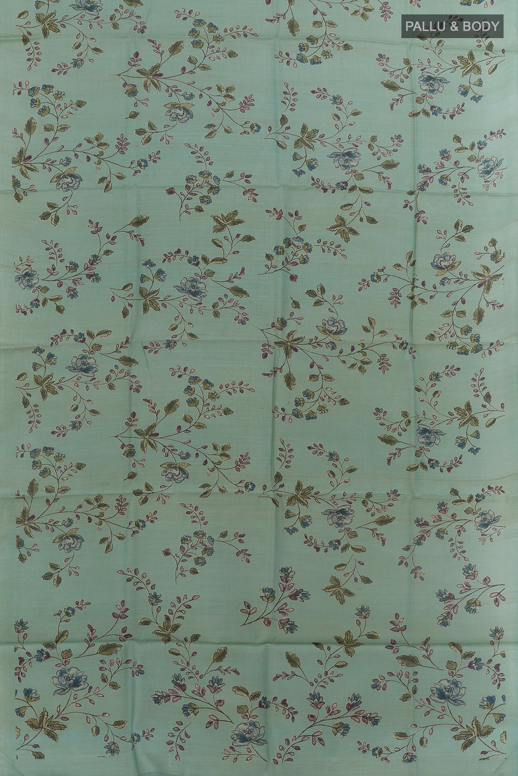 Flat view of Mint Green Tussar Silk Saree with Printed design on the body and Without Border. 