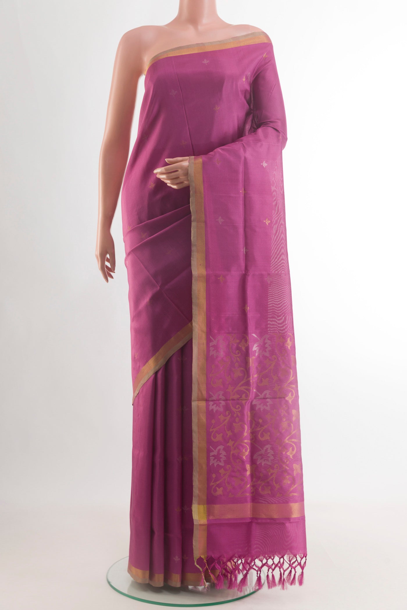 Pink Uppada Silk Saree with Zari Butta on the body and Zari Border.  displayed on a mannequin
