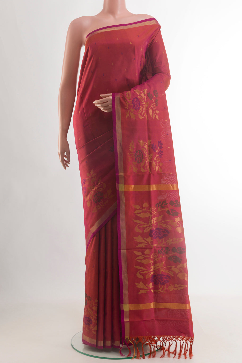 Pure Silk Pure Zari Pink with Orange Color Uppada Saree with Zari Butta on the body and Zari Border.  displayed on a mannequin