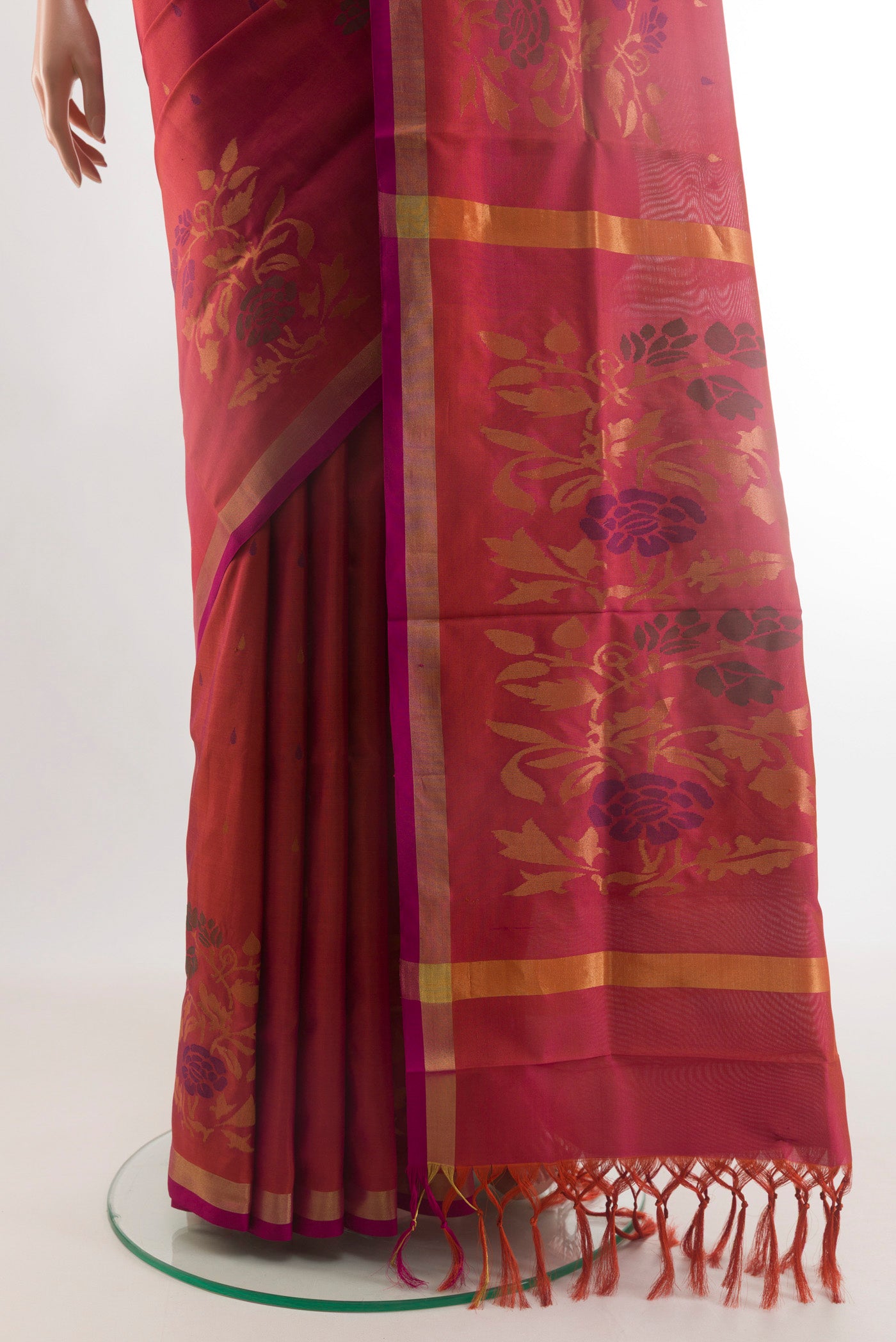 Pleats and pallu of Pure Silk Pure Zari Pink with Orange Color Uppada Saree with Zari Butta on the body and Zari Border. 