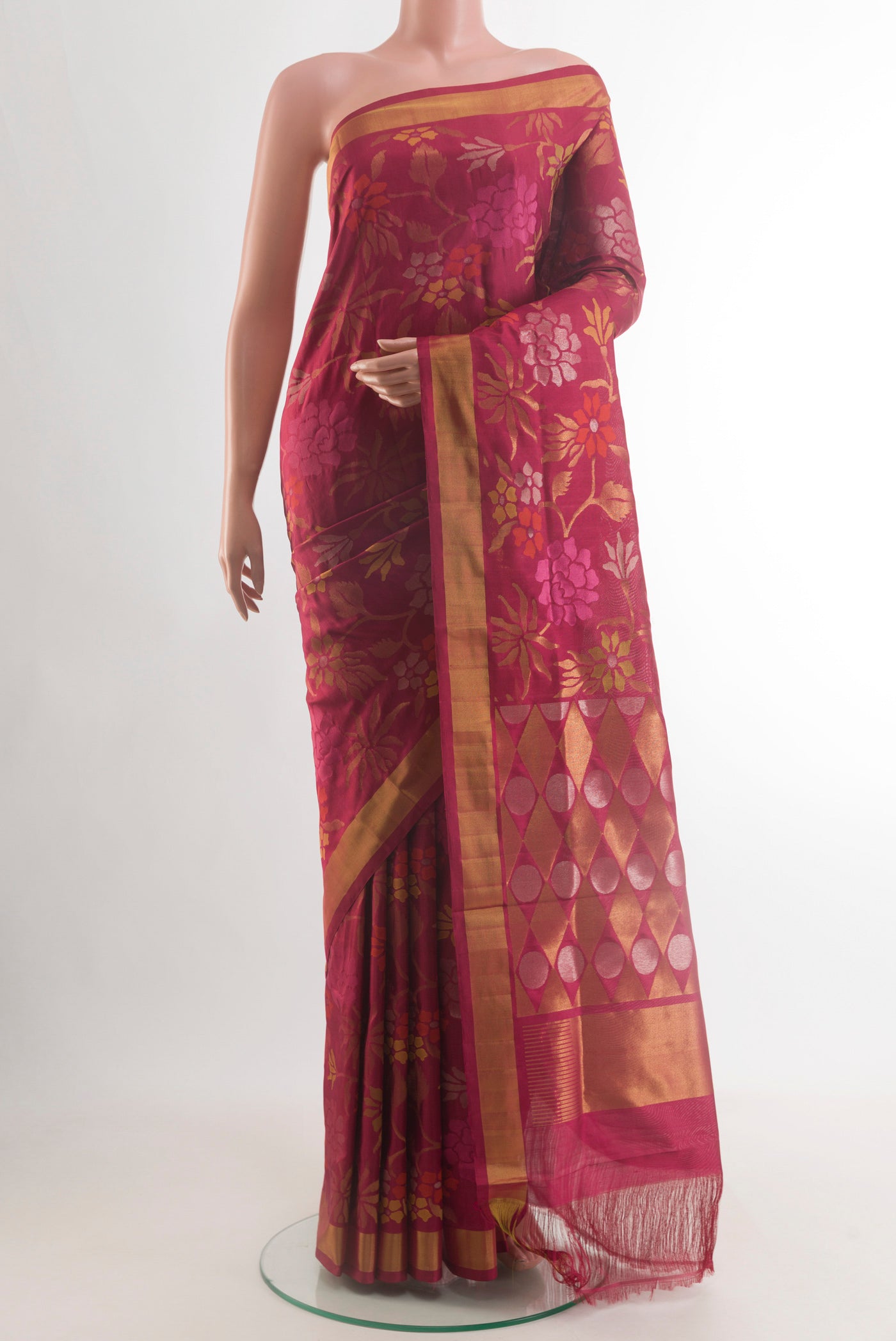 Pure Silk Pure Zari Maroon Uppada Saree with Zari Brocade on the body and Zari Border.  displayed on a mannequin