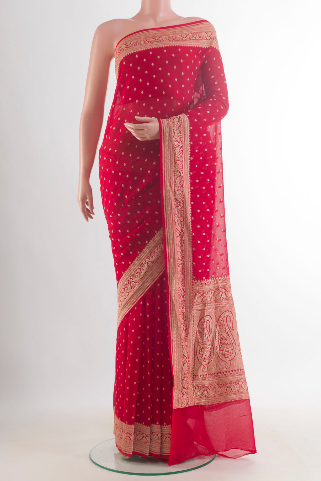 Red Banarasi Georgette Saree with Zari Butta on the body and Zari Border.  displayed on a mannequin
