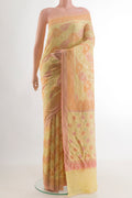 Yellow Banarasi Georgette Saree with Zari Brocade on the body and Zari Border.  displayed on a mannequin