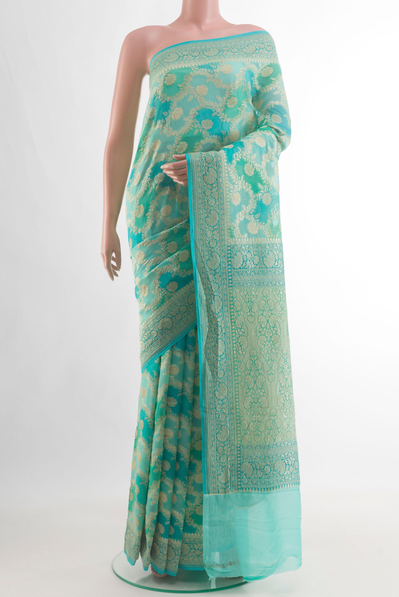 Blue Banarasi Georgette Saree with Zari Brocade on the body and Zari Border.  displayed on a mannequin