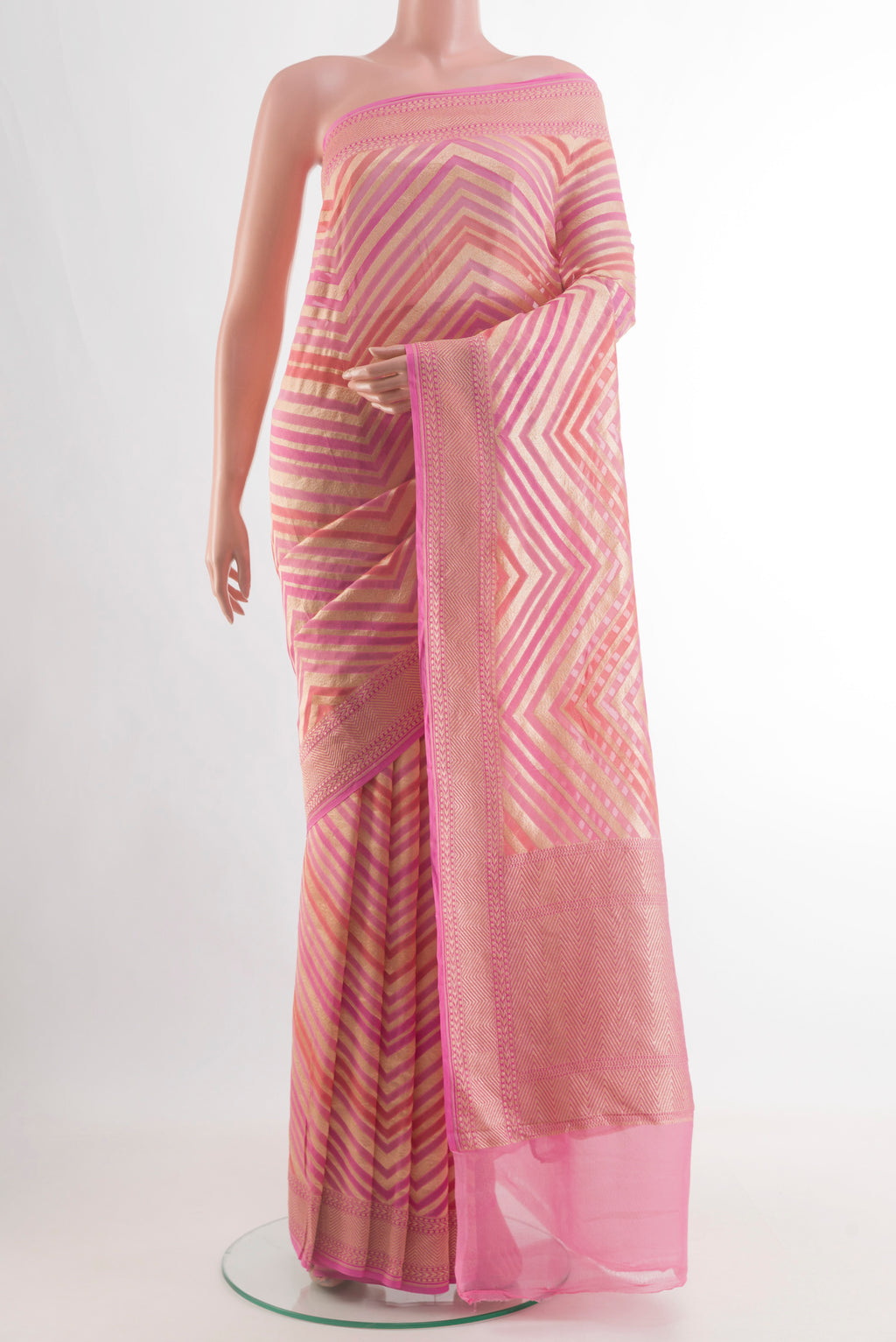 Pink Banarasi Georgette Saree with Zari Brocade on the body and Zari Border.  displayed on a mannequin