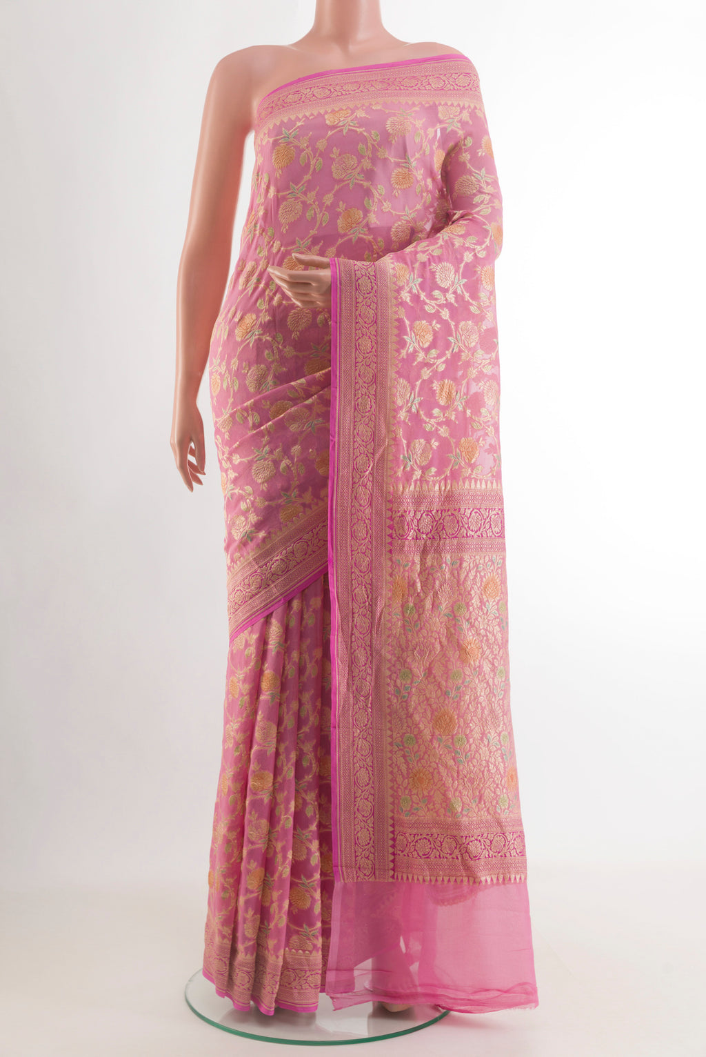 Pink Banarasi Georgette Saree with Zari Brocade on the body and Zari Border.  displayed on a mannequin