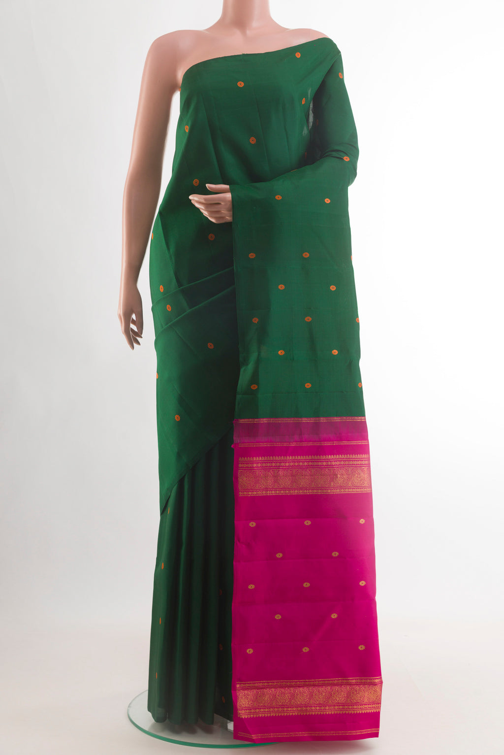 Bottle Green Kanchipuram Silk Saree with Thread Butta on the body and Without Border.  displayed on a mannequin