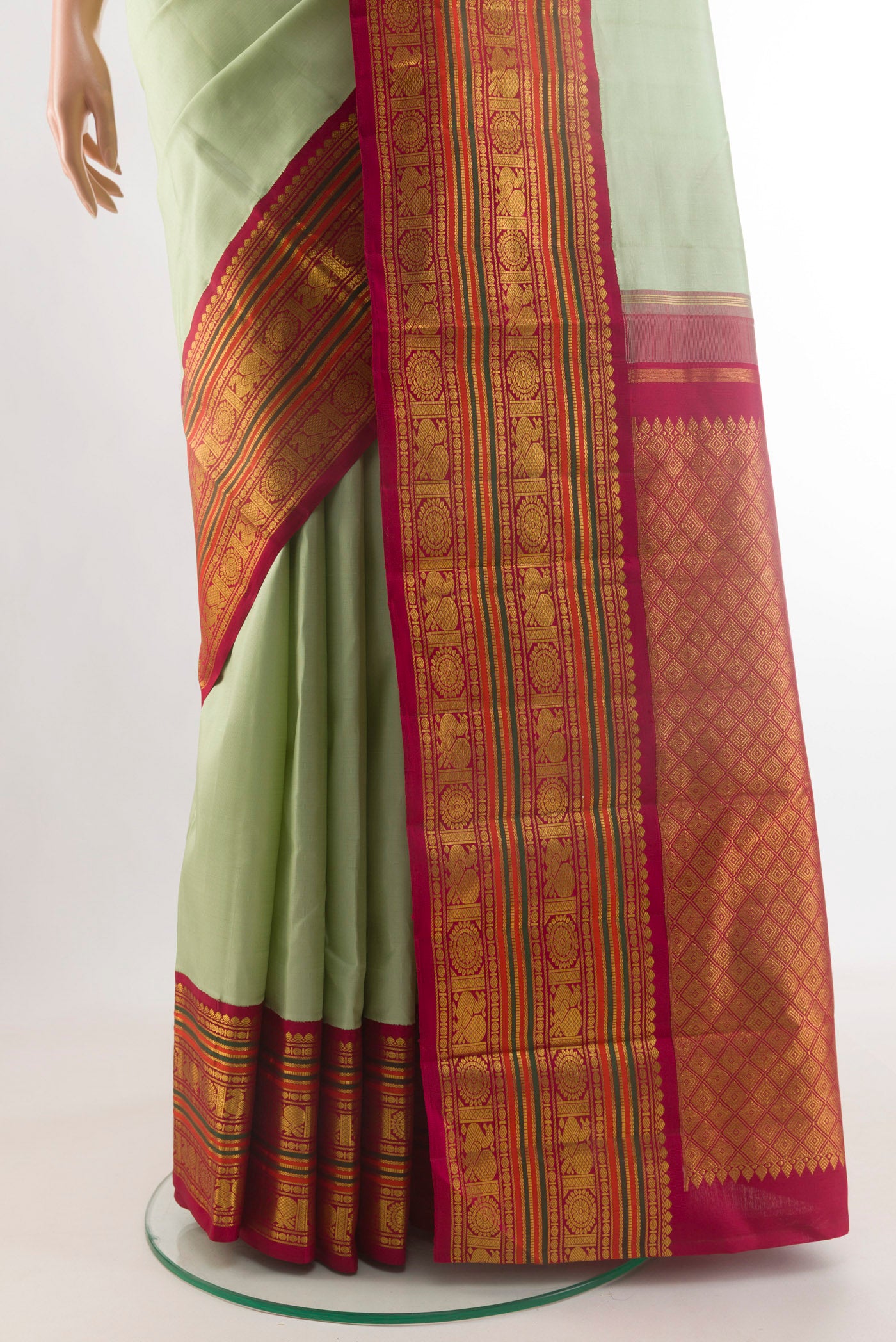Pleats and pallu of Mint Green Kanjivaram Silk Saree with Plain Body and Zari Border. 