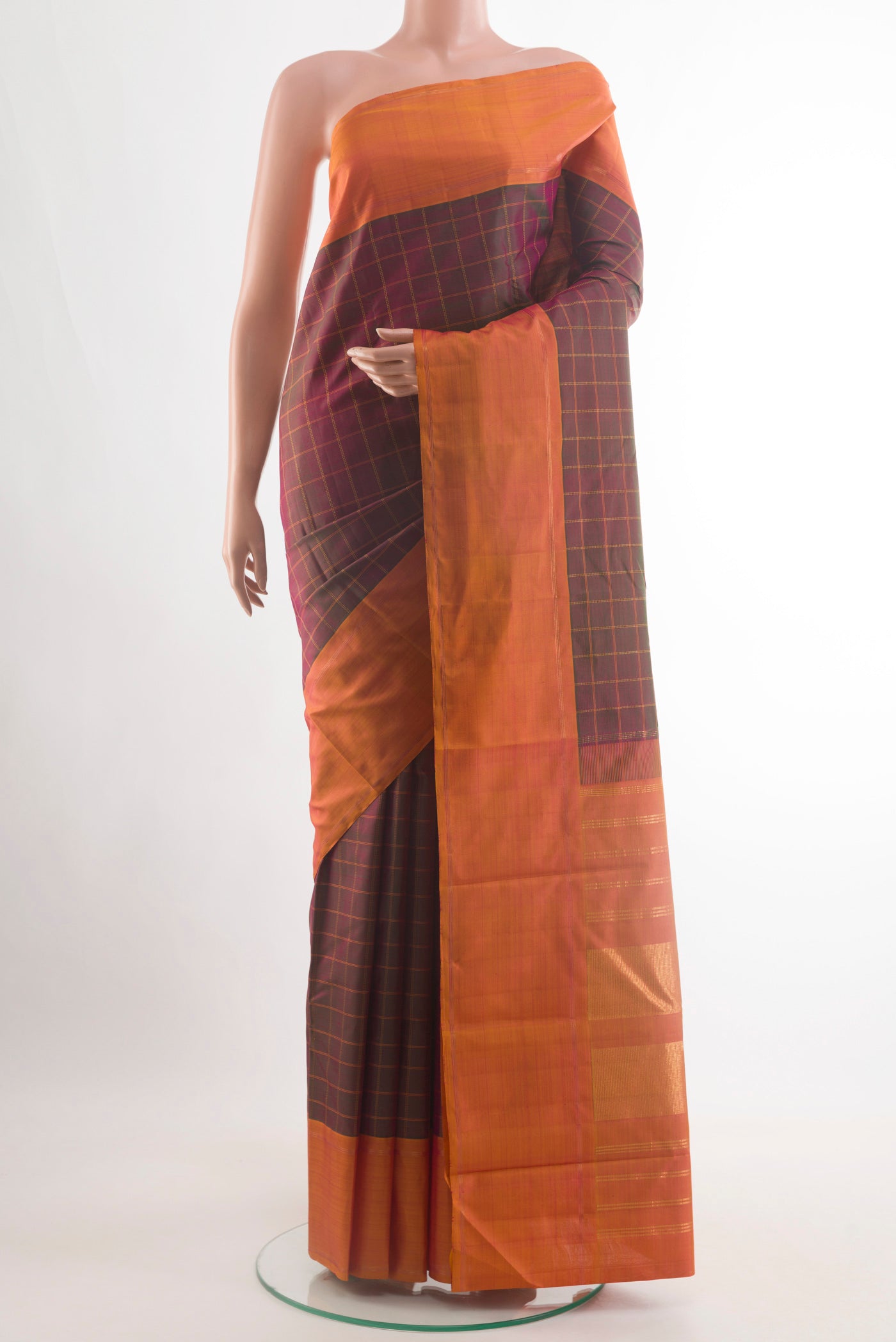 Multi Color Kanjivaram Silk Saree with Checked design on the body and Plain Border.  displayed on a mannequin