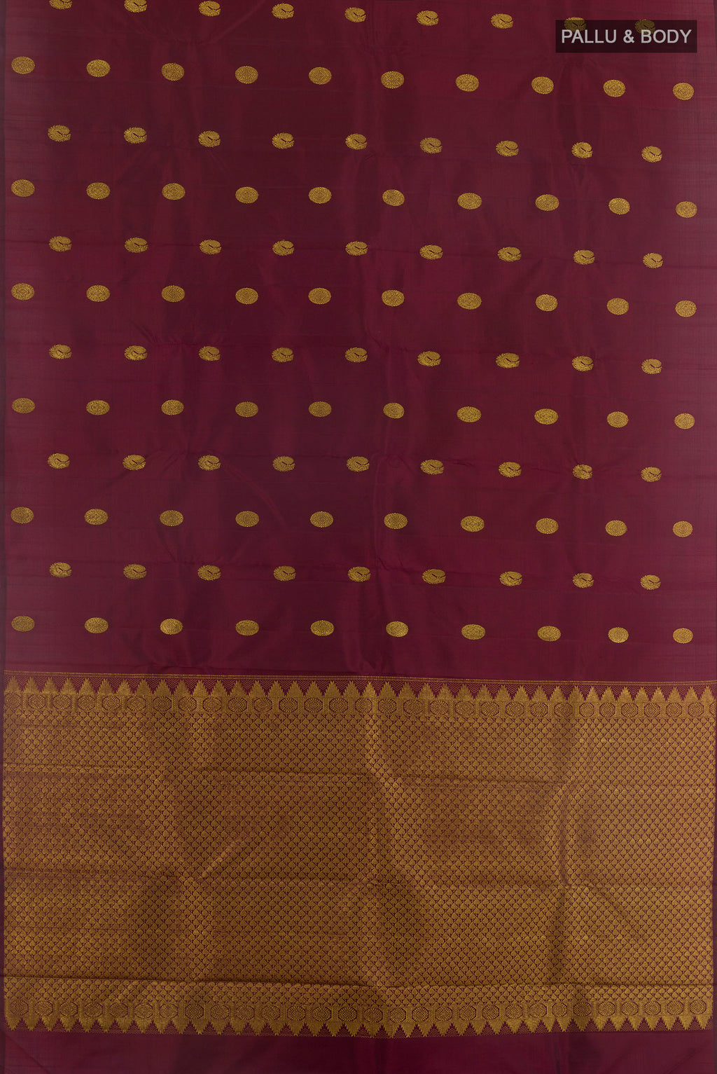 Flat view of Maroon Kanchipuram Silk Saree with Zari Butta on the body and Without Border. 