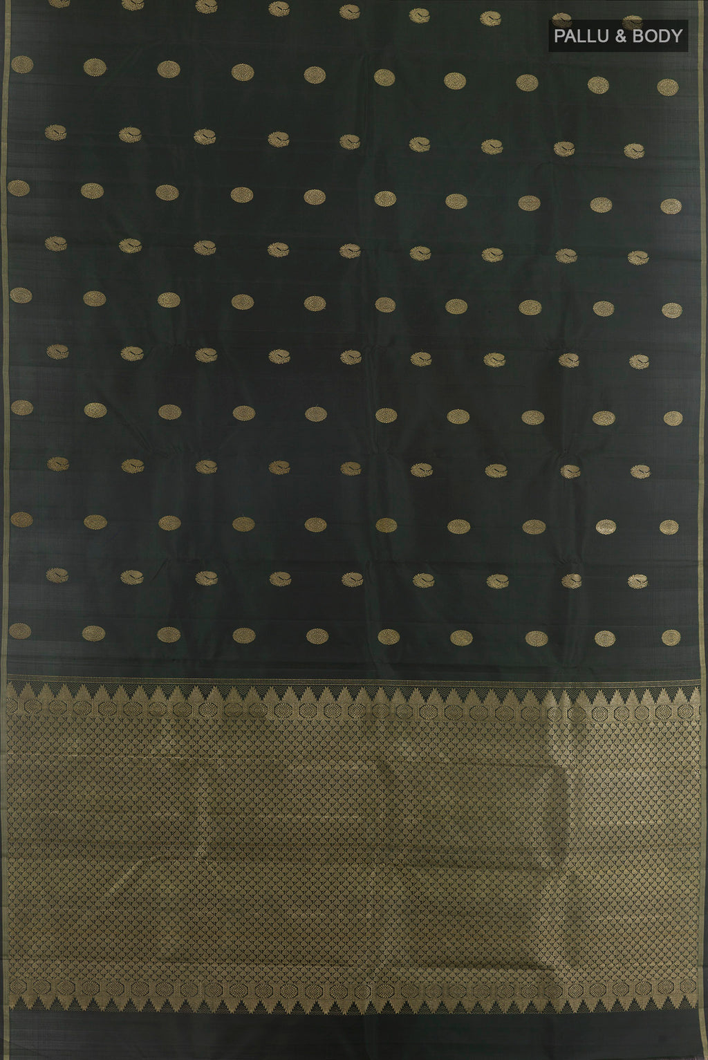 Flat view of Bottle Green Kanchipuram Silk Saree with Zari Butta on the body and Zari Border. 