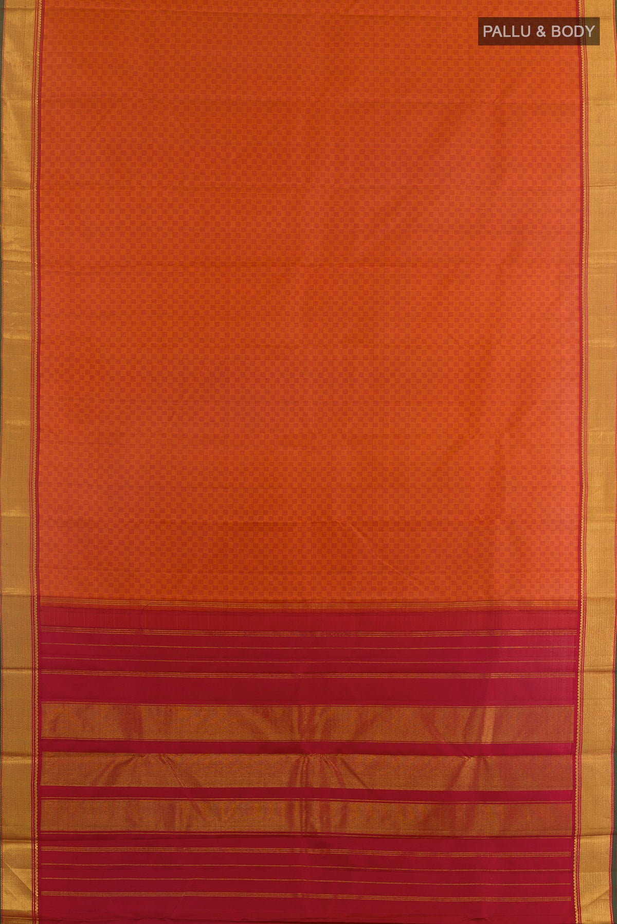 Flat view of Brick Orange Kanchipuram Silk Saree with Jacquard design on the body and Zari Border. 