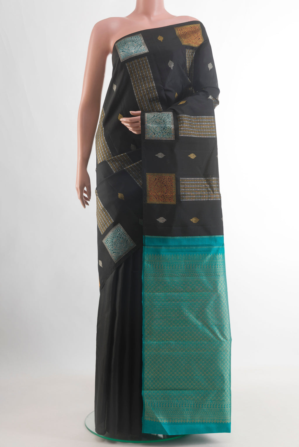 Black Kanjivaram Silk Saree with Stripes on the body and Without Border.  displayed on a mannequin