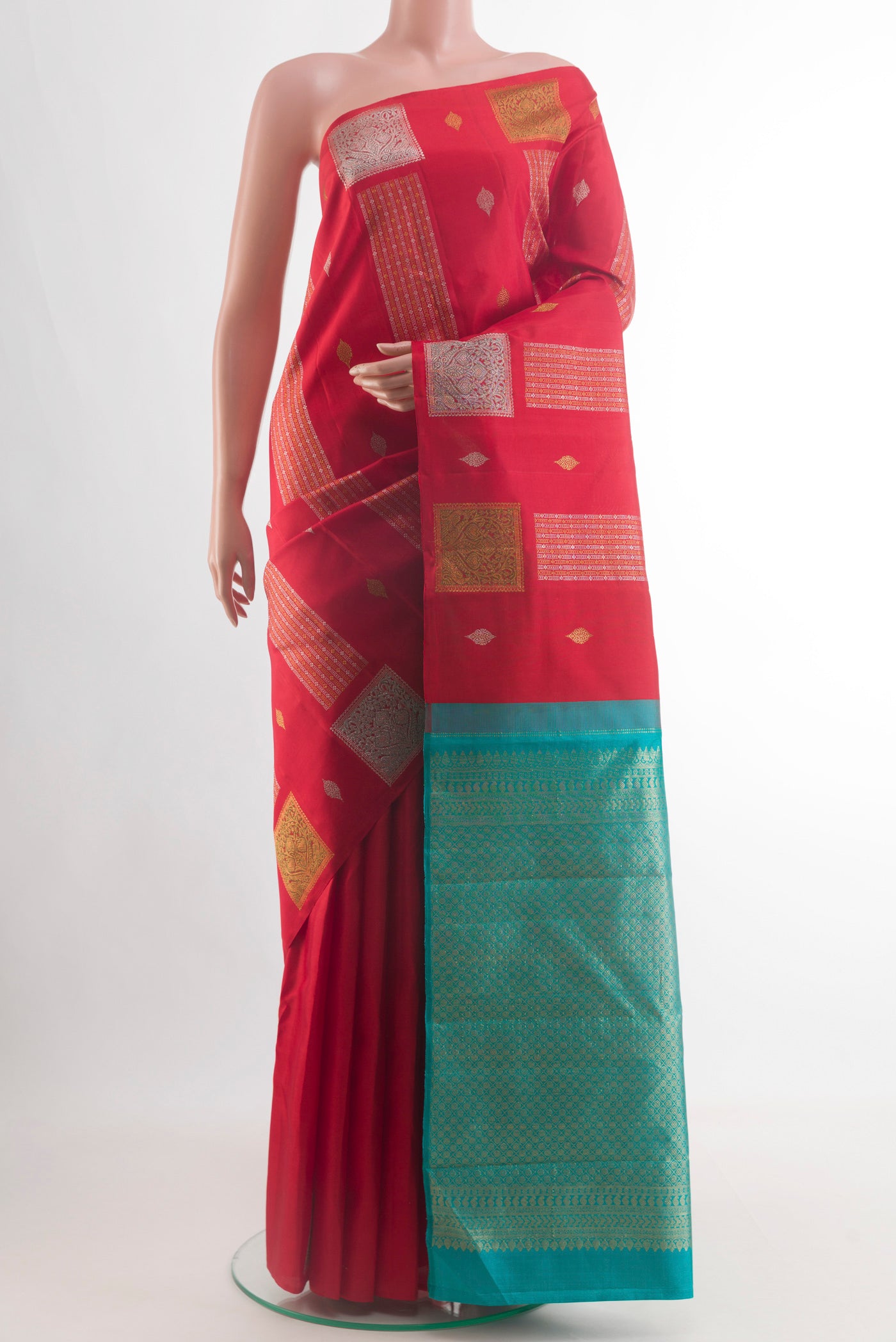 Red Kanjivaram Silk Saree with Stripes on the body and Without Border.  displayed on a mannequin