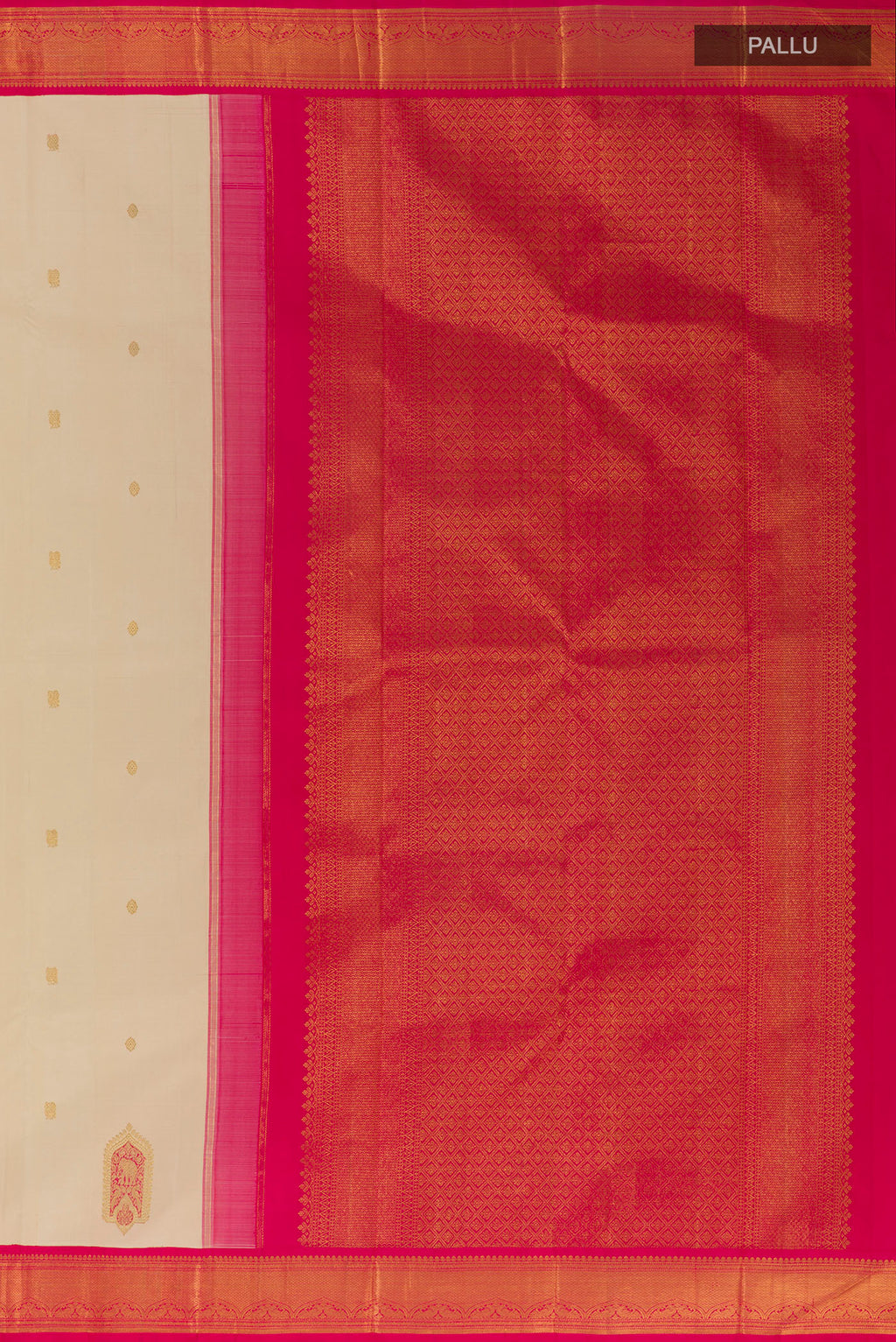 Close up image of the pallu of Cream Kanjivaram Silk Saree with Zari Butta on the body and Zari Border. 