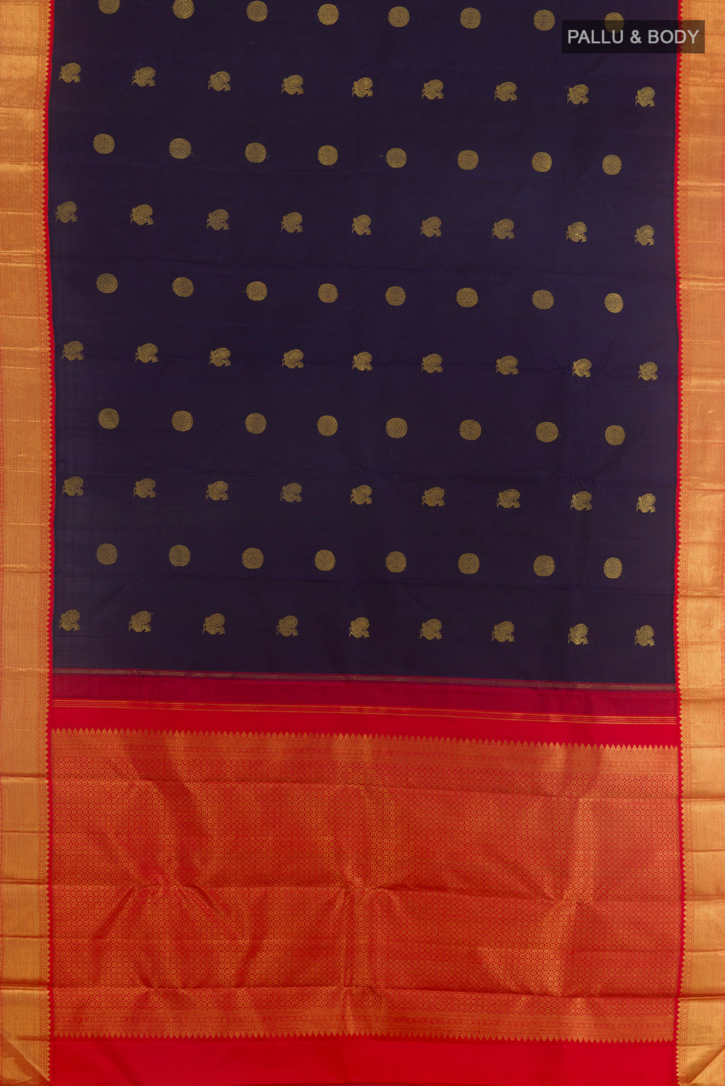 Flat view of Navy Blue Kanchipuram Silk Saree with Zari Butta on the body and Zari Border. 