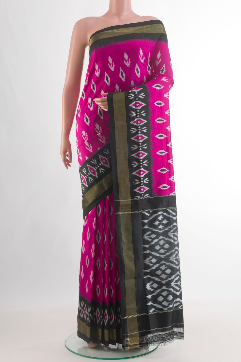 Light Magenta Pochampally Silk Saree with Pure Ikat on the body and Ikat Border.  displayed on a mannequin