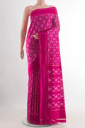 Rani Pink Pochampally Silk Saree with Ikat design on the body and Plain Border.  displayed on a mannequin
