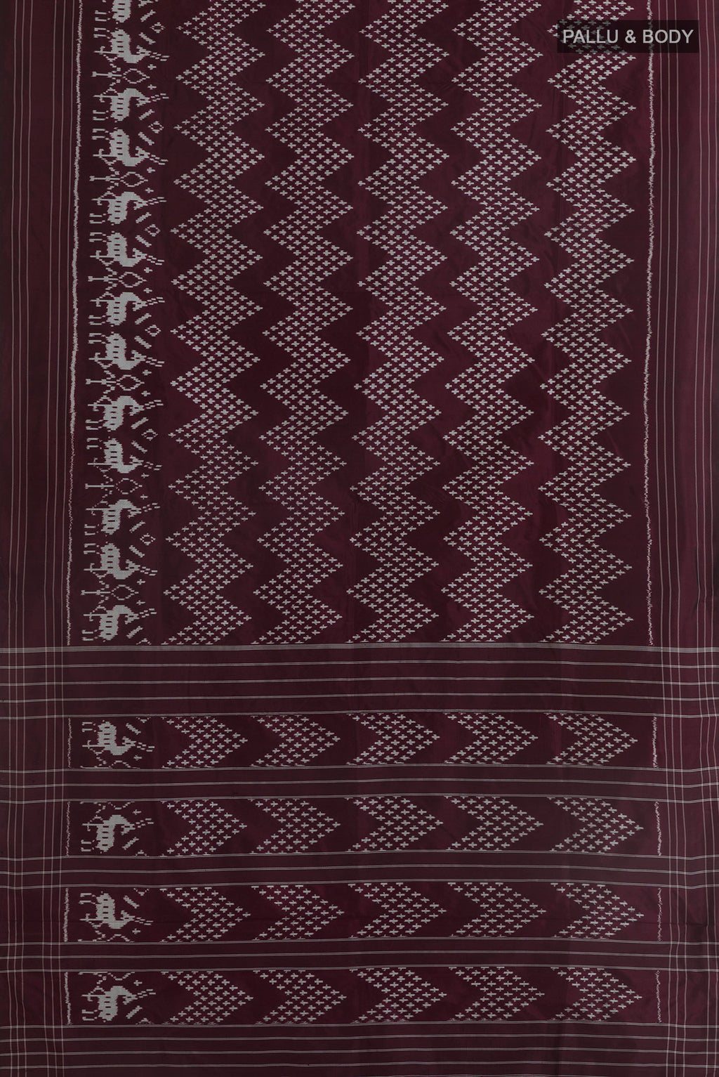 Flat view of Brown Pochampally Silk Saree with Ikat design on the body and Plain Border. 