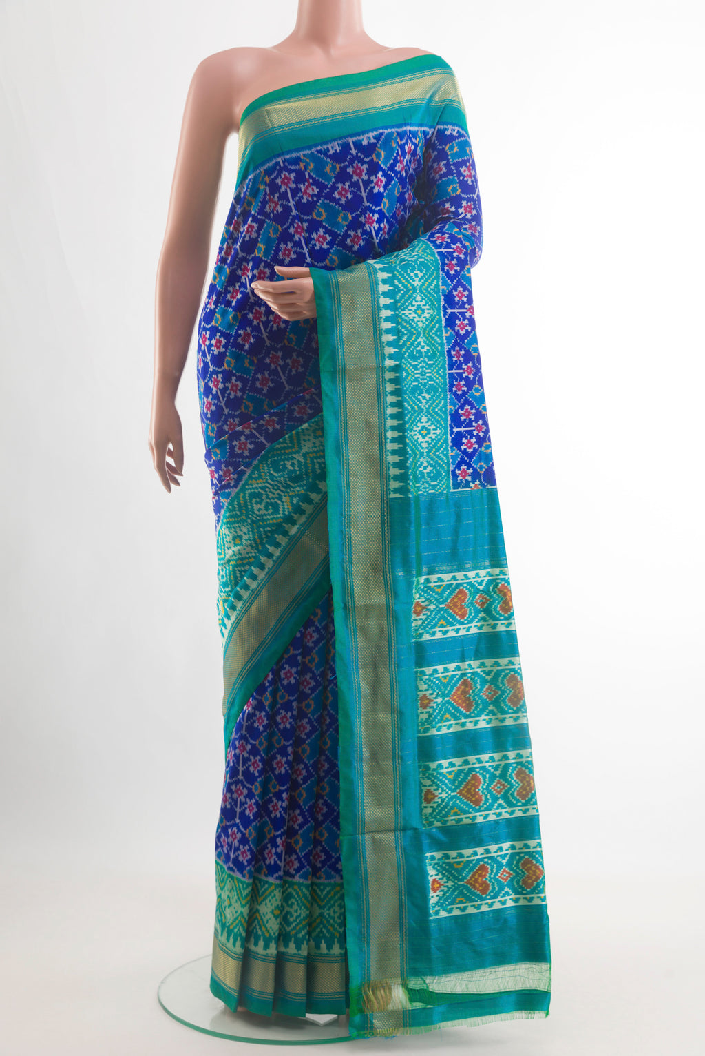 Blue Pochampally Silk Saree with Pure Ikat on the body and Zari Border.  displayed on a mannequin