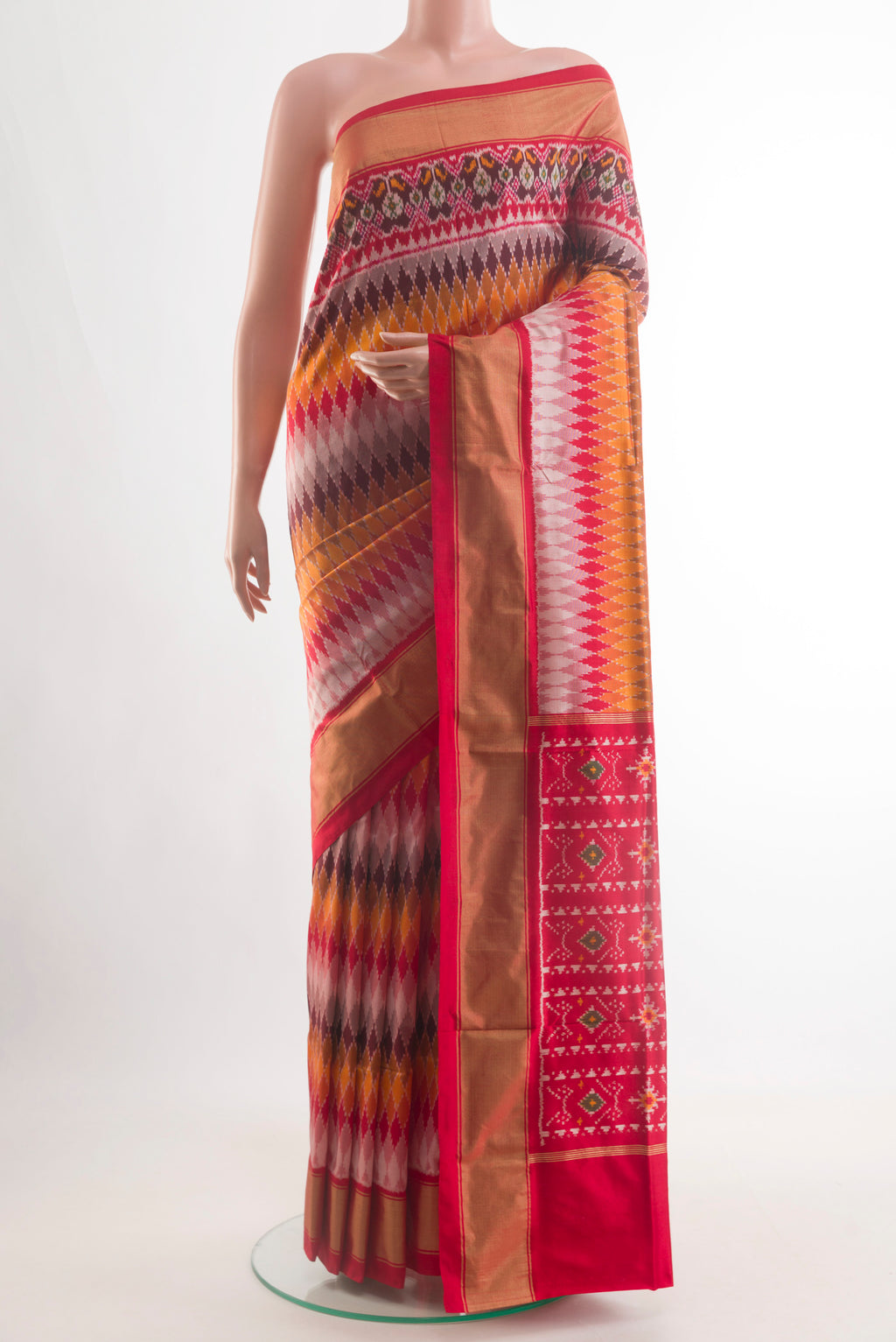 Multi Color Pochampally Silk Saree with Pure Ikat on the body and Zari Border.  displayed on a mannequin