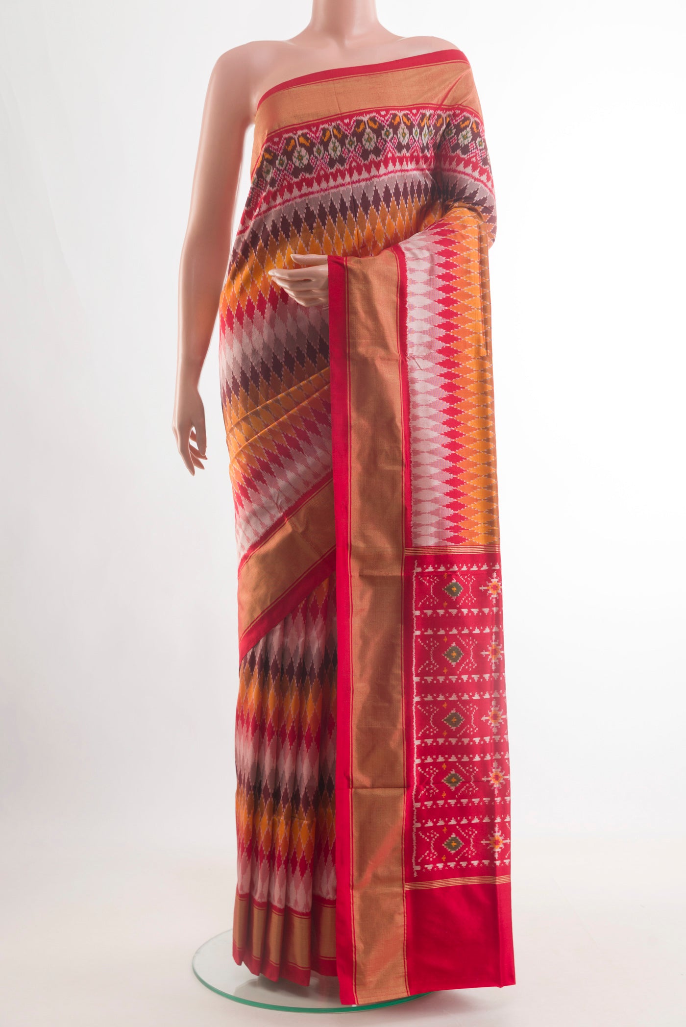 Multi Color Pochampally Silk Saree with Pure Ikat on the body and Zari Border.  displayed on a mannequin