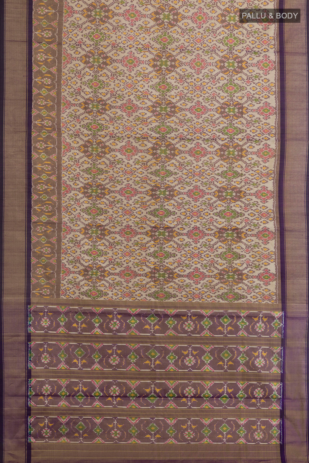 Flat view of Off White Pochampally Silk Saree with Ikat design on the body and Zari Border. 