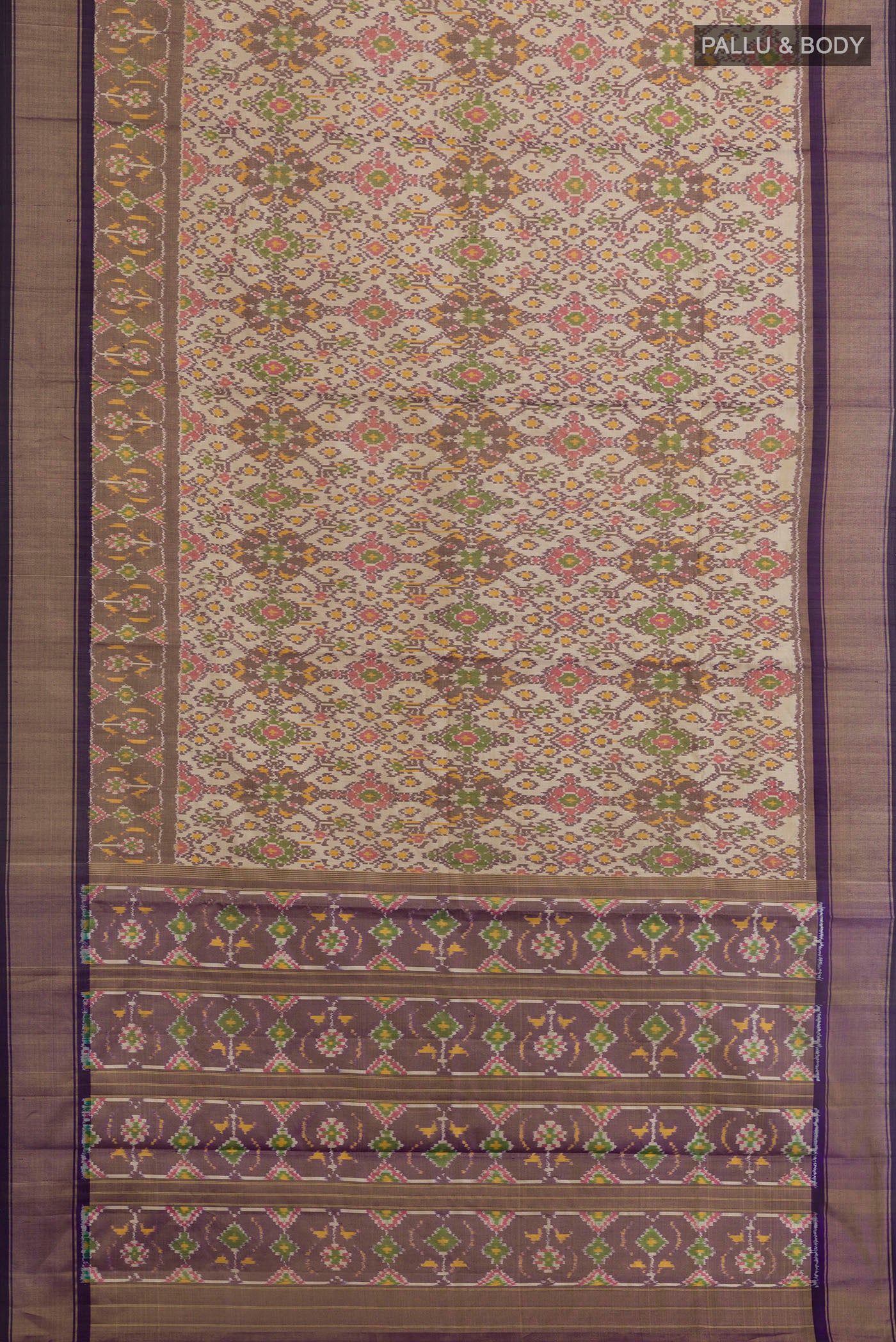 Flat view of Off White Pochampally Silk Saree with Ikat design on the body and Zari Border. 