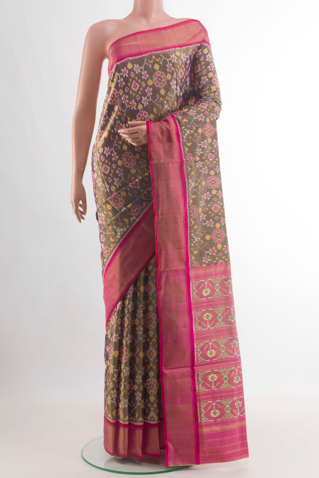 Purple Pochampally Silk Saree with Ikat design on the body and Zari Border.  displayed on a mannequin
