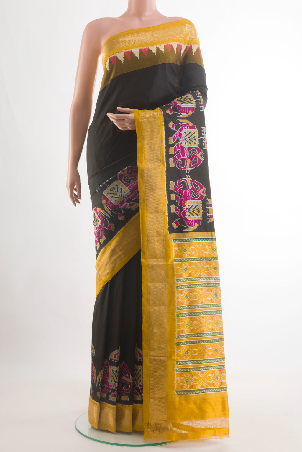 Black Pochampally Silk Saree with Plain Body and Ikat Border.  displayed on a mannequin