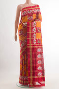 Multi Color Pochampally Silk Saree with Checked design on the body and Zari Border.  displayed on a mannequin