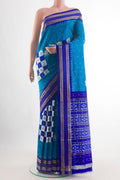 Blue Pochampally Silk Saree with Pure Ikat on the body and Zari Border.  displayed on a mannequin