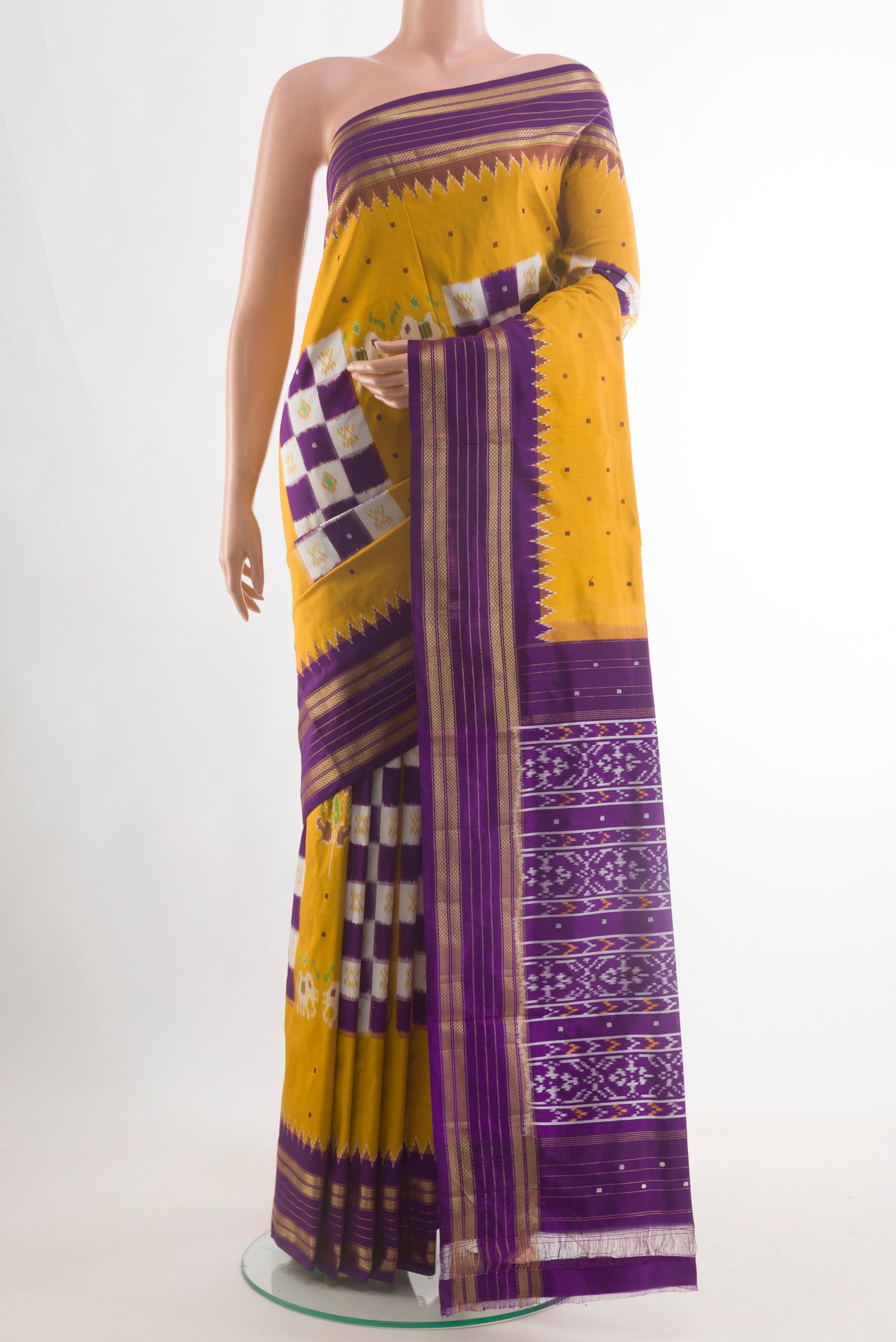 Yellow Pochampally Silk Saree with Pure Ikat on the body and Zari Border.  displayed on a mannequin