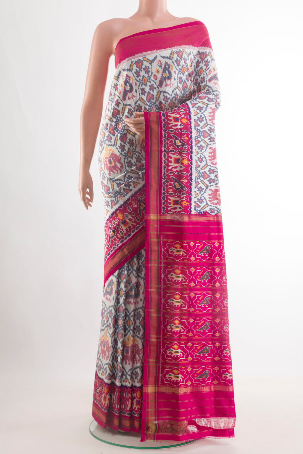 Off White Pochampally Silk Saree with Pure Ikat on the body and Zari Border.  displayed on a mannequin
