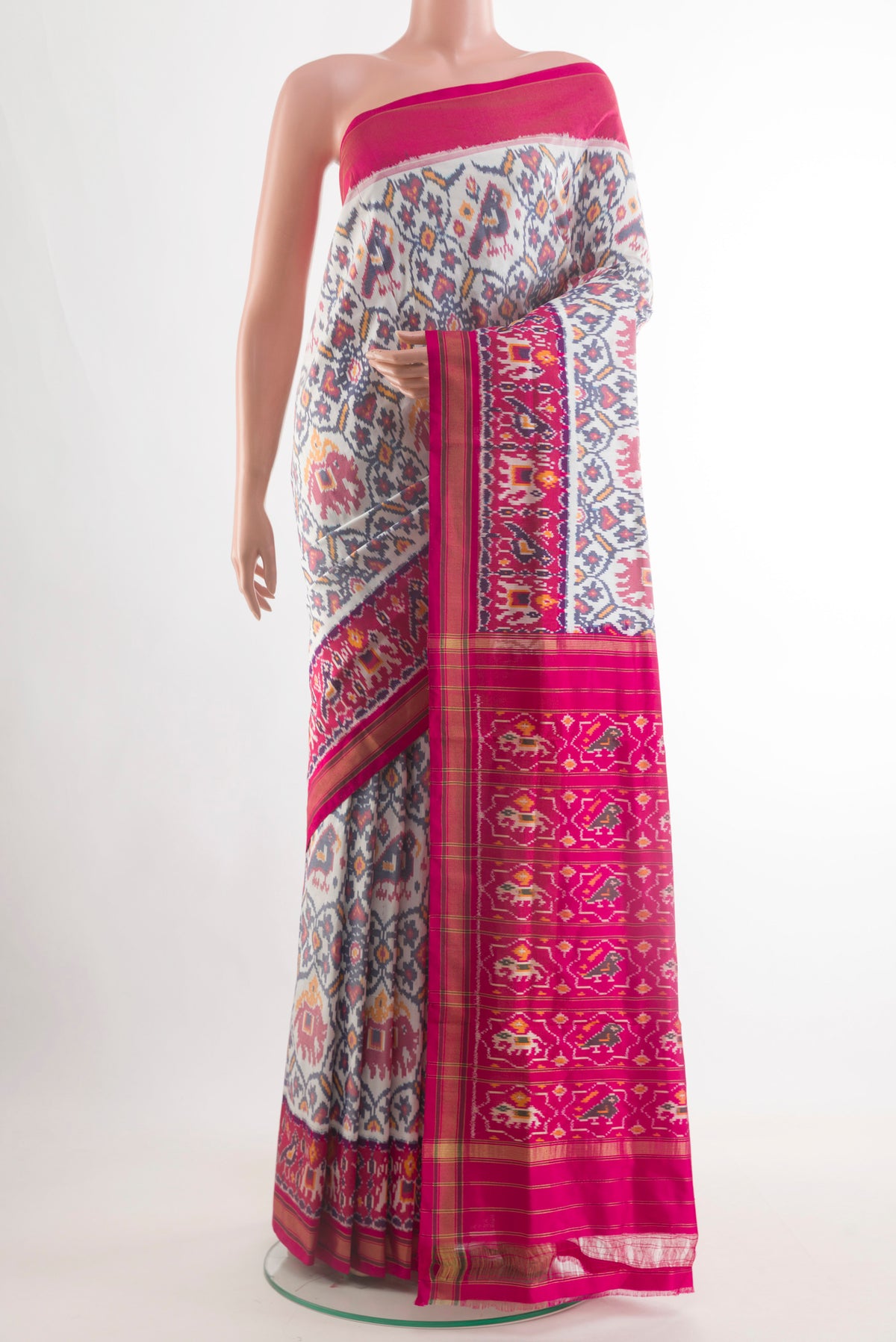 Off White Pochampally Silk Saree with Pure Ikat on the body and Zari Border.  displayed on a mannequin