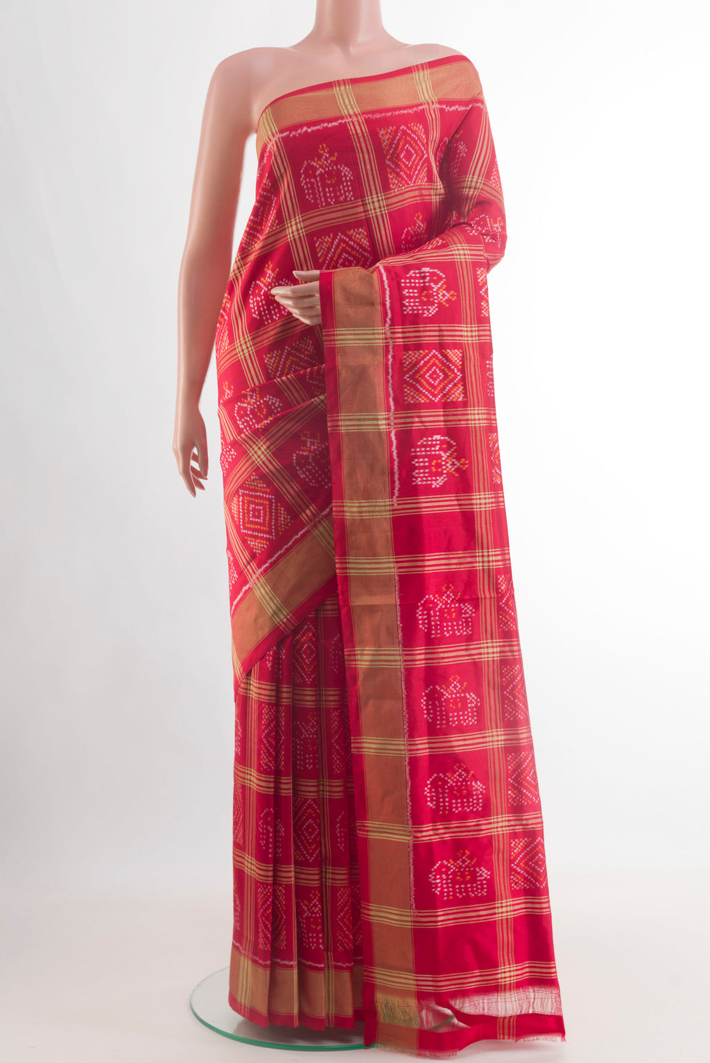 Red Pochampally Silk Saree with Ikat design on the body and Zari Border.  displayed on a mannequin