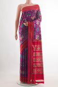 Purple Pochampally Silk Saree with Pure Ikat on the body and Plain Border.  displayed on a mannequin