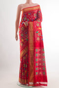 Red Pochampally Silk Saree with Pure Ikat on the body and Zari Border.  displayed on a mannequin
