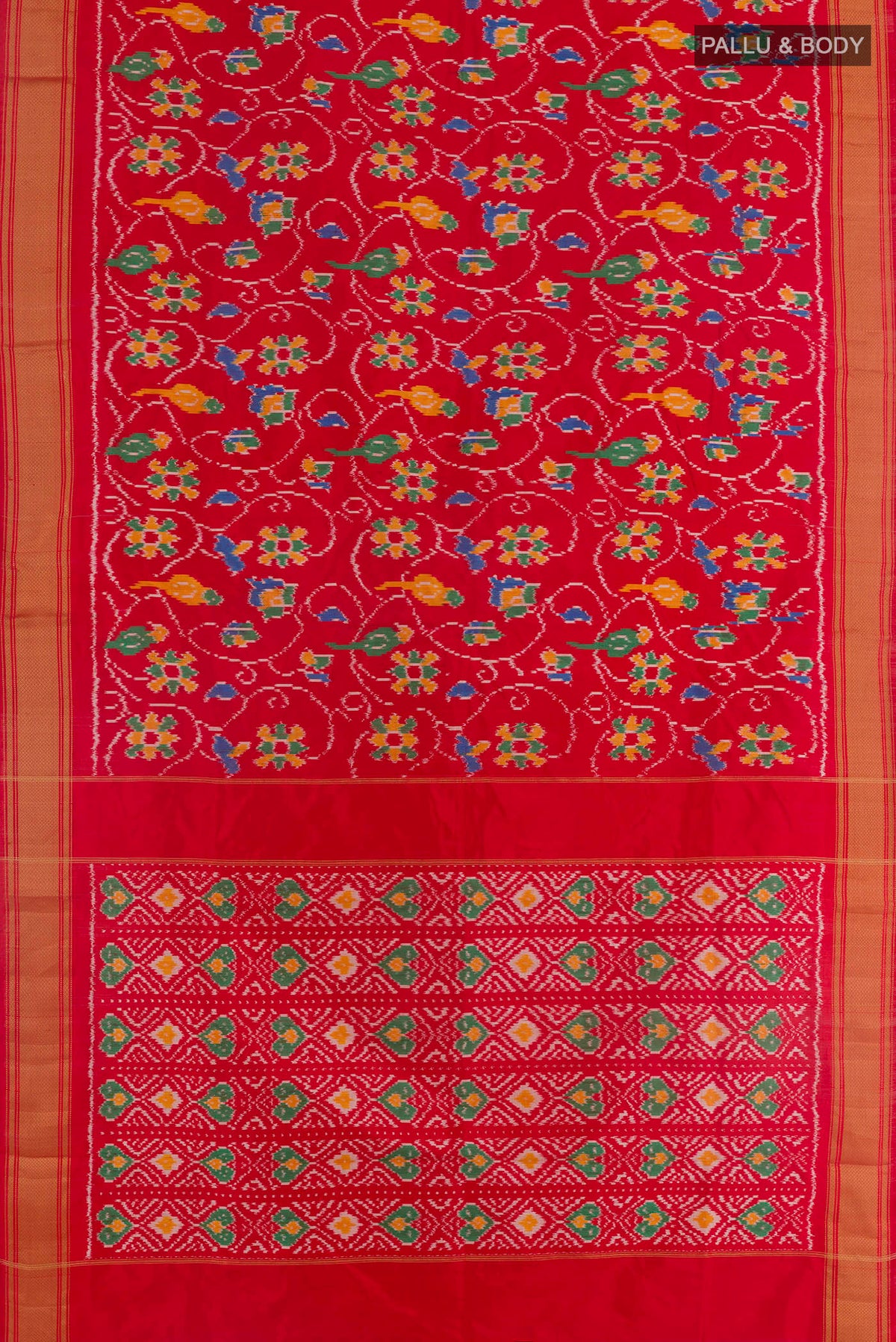 Flat view of Red Pochampally Silk Saree with Pure Ikat on the body and Zari Border. 