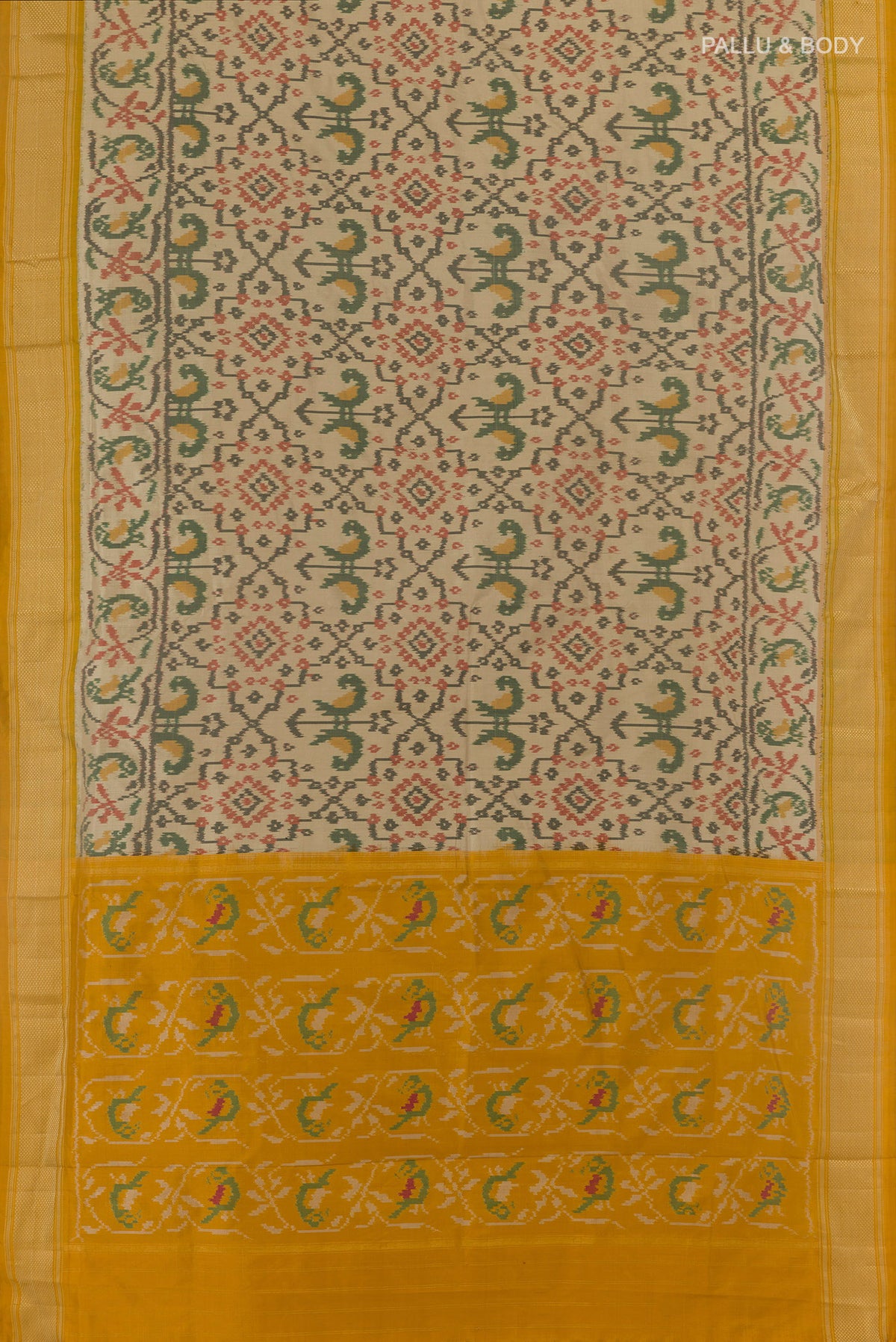 Flat view of Beige Pochampally Silk Saree with Pure Ikat on the body and Zari Border. 