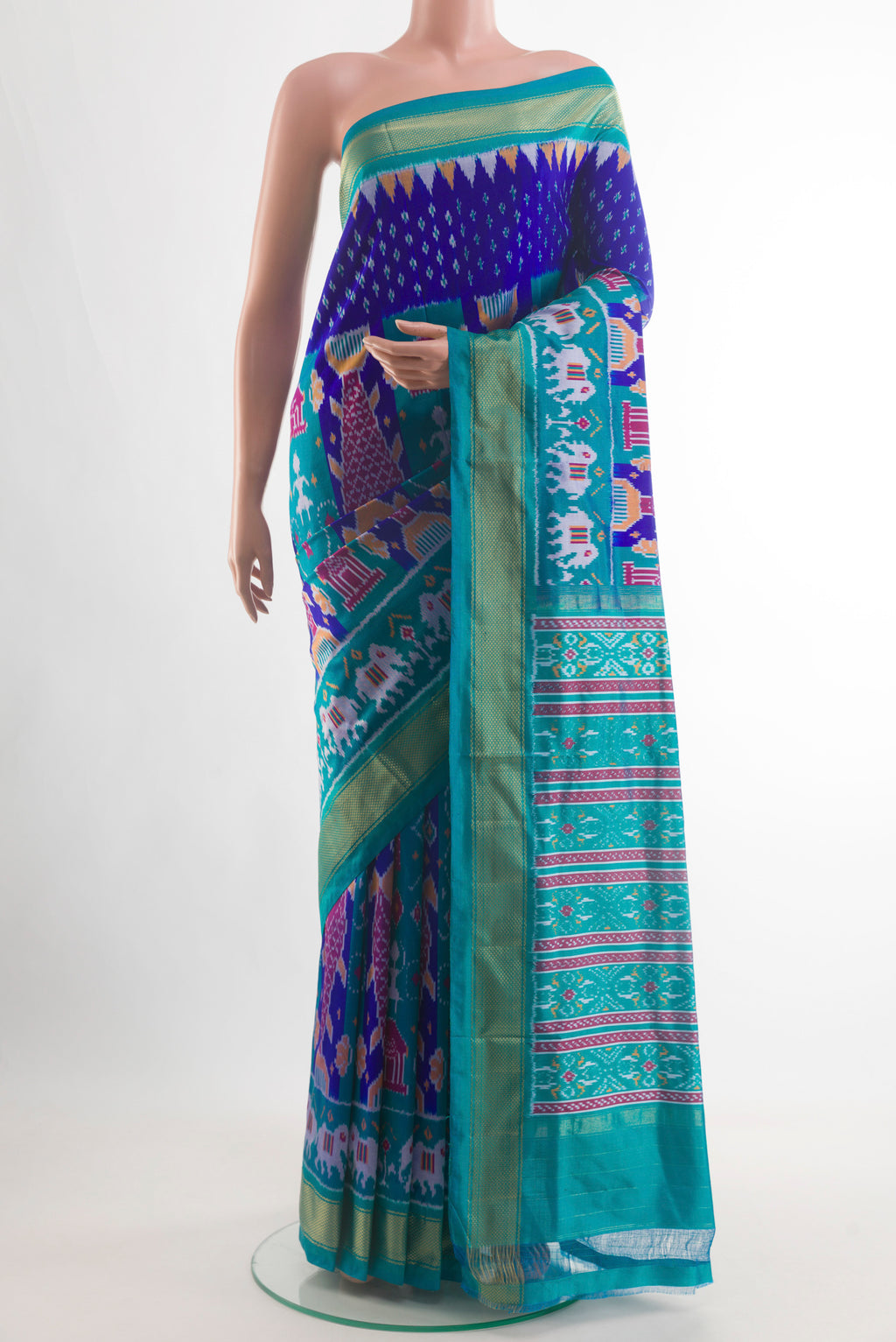 Royal Blue Pochampally Silk Saree with Pure Ikat on the body and Ikat Border.  displayed on a mannequin