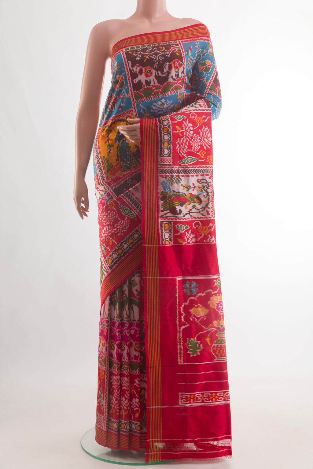 Multi Color Pochampally Silk Saree with Pure Ikat on the body and Ikat Border.  displayed on a mannequin