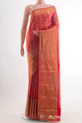 Red Pochampally Silk Saree with Pure Ikat on the body and Zari Border.  displayed on a mannequin