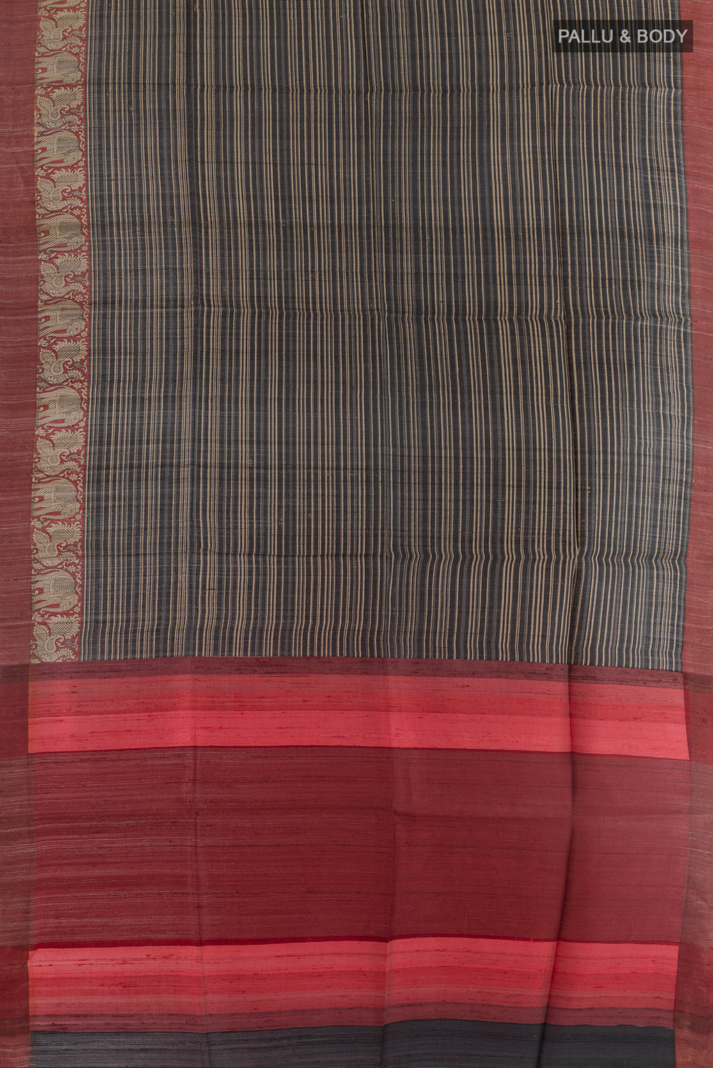 Flat view of Black Tussar Silk Saree with Stripes on the body and Zari Border. 