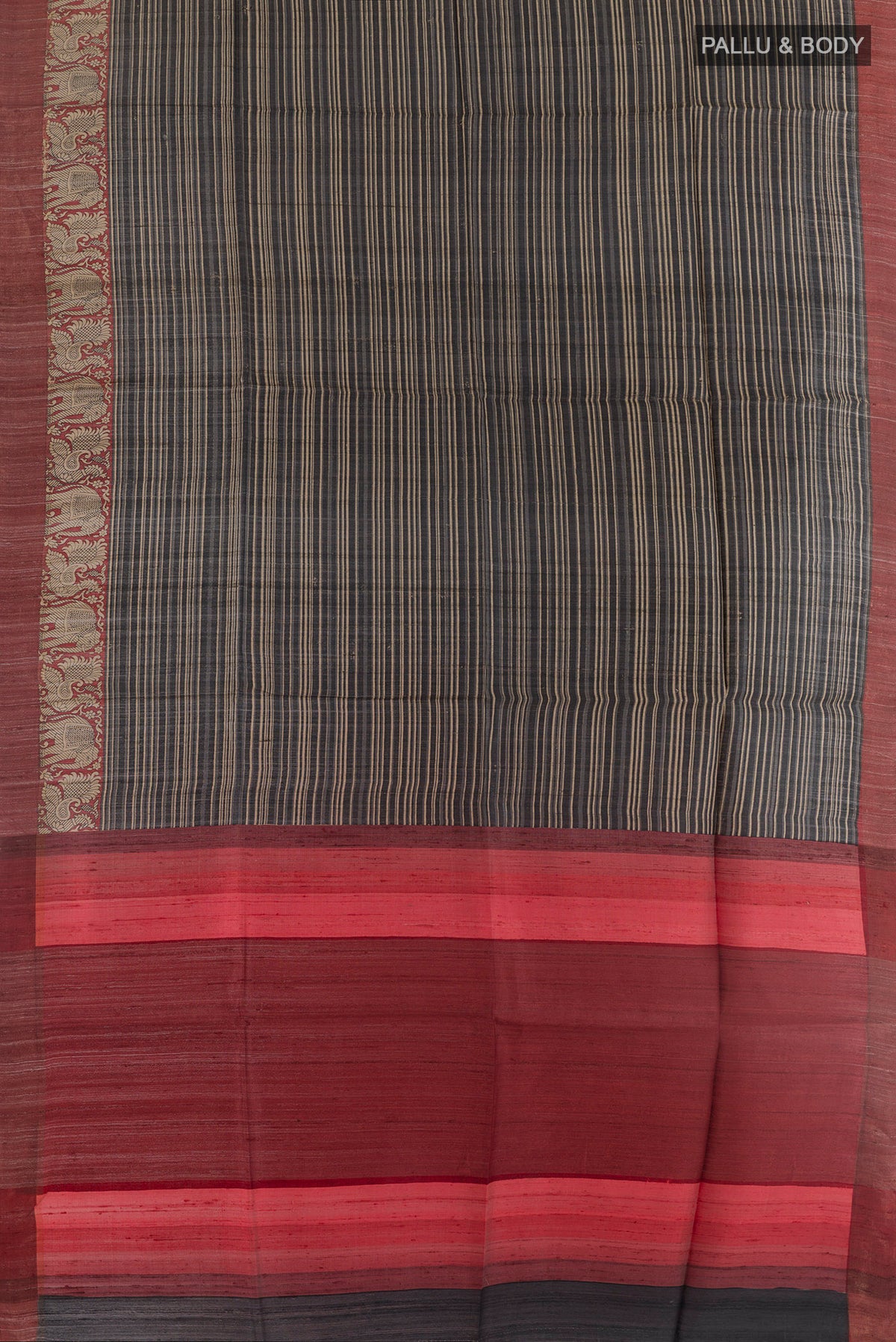 Flat view of Black Tussar Silk Saree with Stripes on the body and Zari Border. 