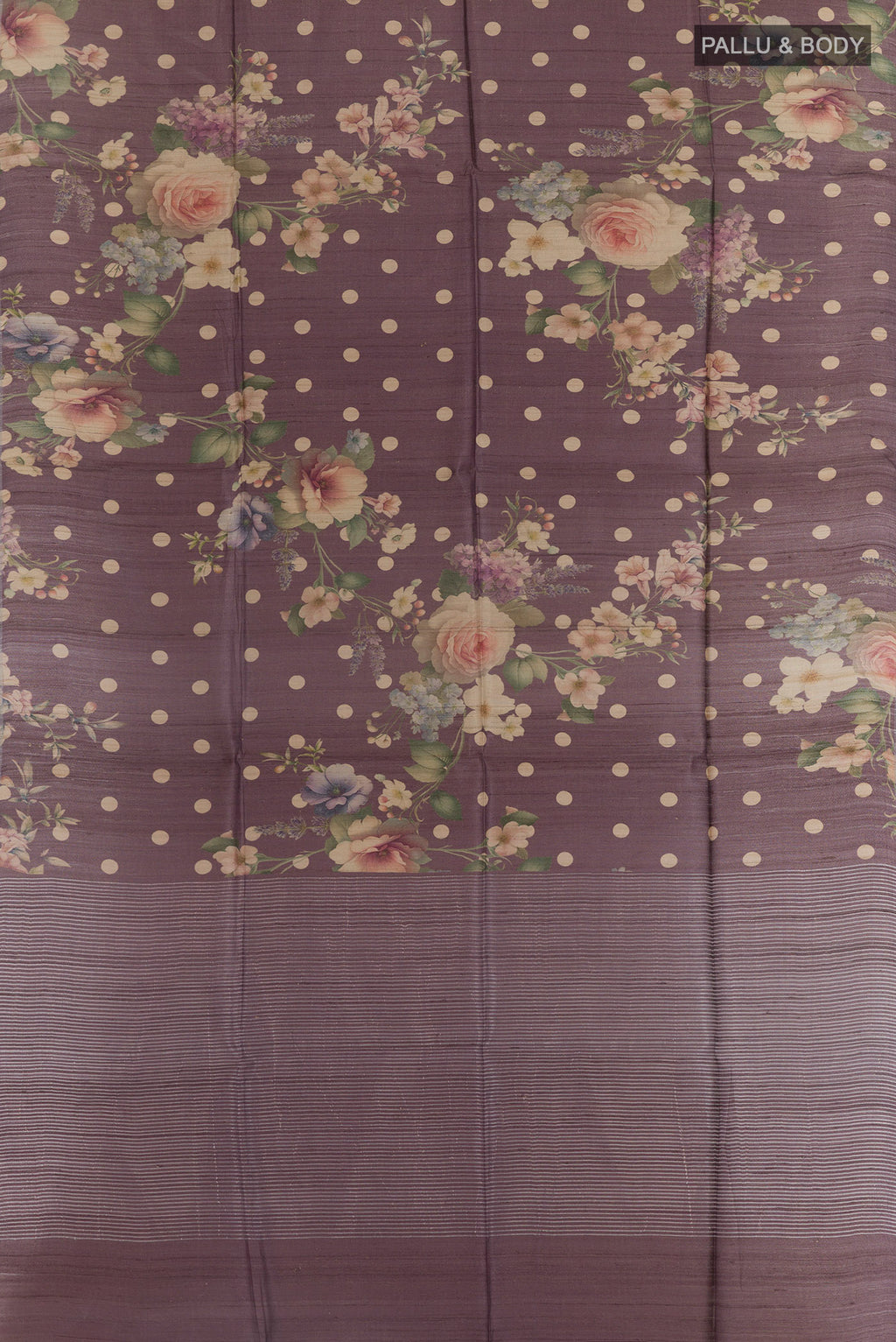 Flat view of Lilac Tussar Silk Saree with Floral Print on the body and Zari Border. 