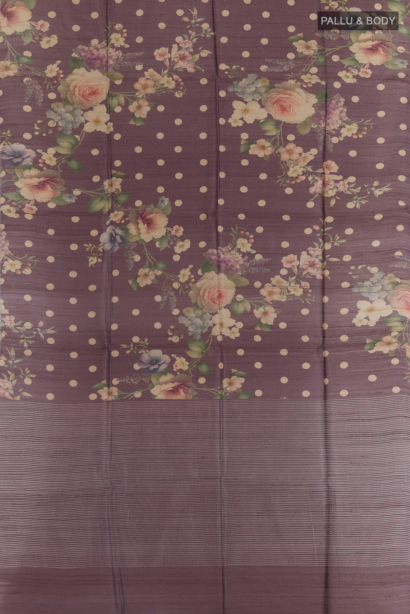 Flat view of Lilac Tussar Silk Saree with Floral Print on the body and Zari Border. 